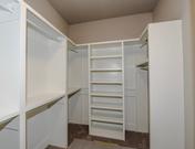 Custom Wood Shelving in Master Closet  at Provence by Waterford Homes at Regency Point